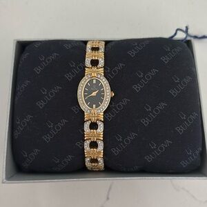 Bulova - crystal gold and silver watch, never worn.